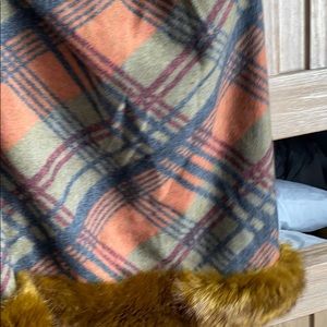 100%wool with faux fur trim